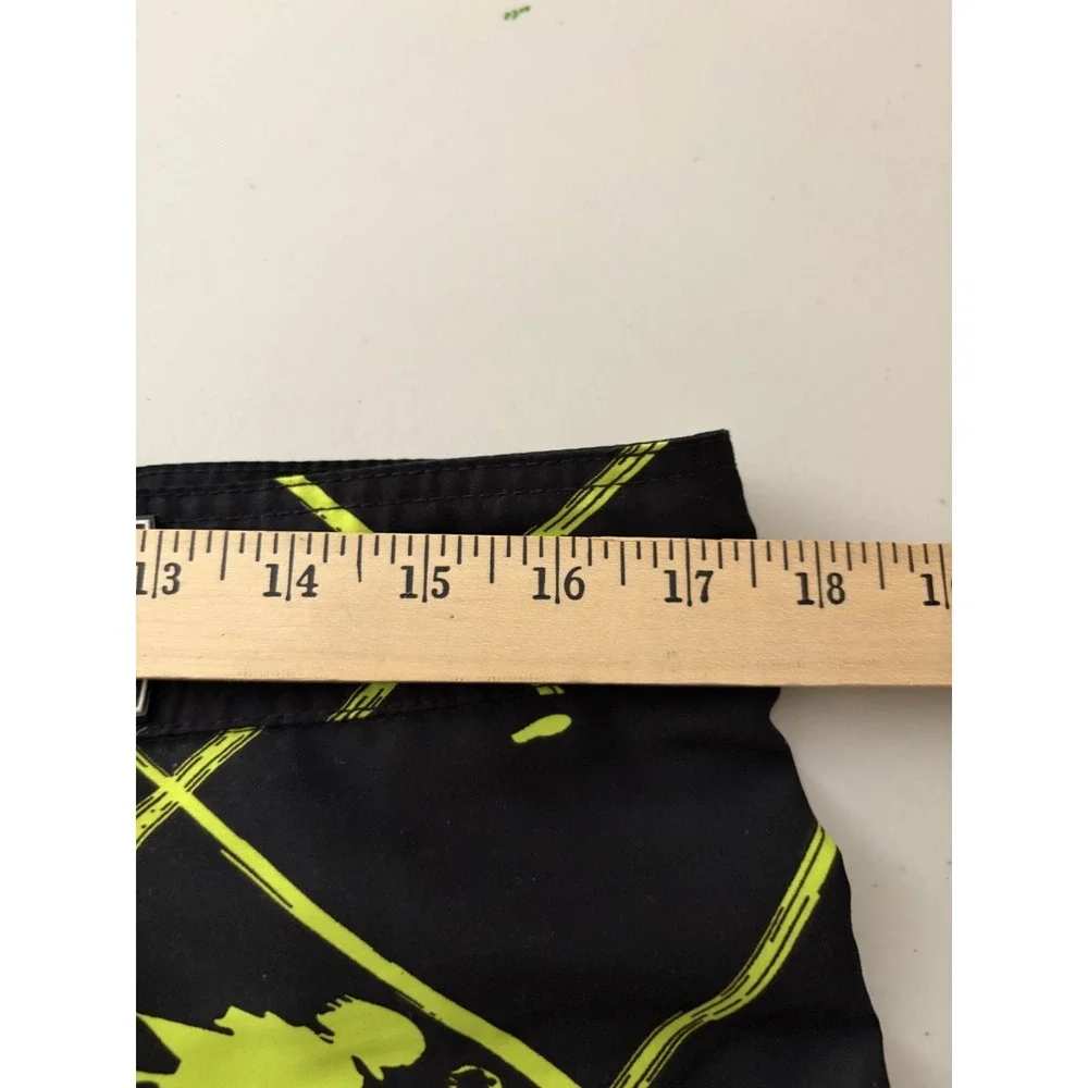 Maui and Sons black swim trunks with neon yellow/green graphic pattern Size 34